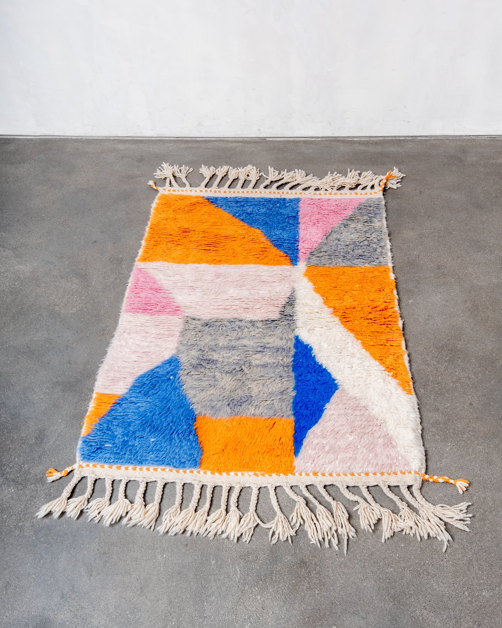 Modern, designer, handcrafted Berber rug from Morocco. Beniourain carpet with beautiful colours and patterns and fluffy wool texture.